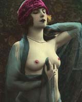 Topless woman draped with silk scarves