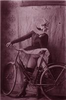 Woman exposing herself on a bike