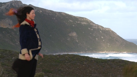 Woman looking out to sea