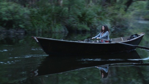 Woman rowing boat