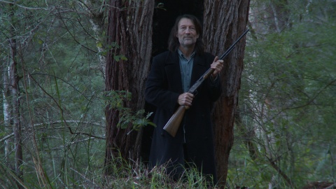 Woman looking out to sea